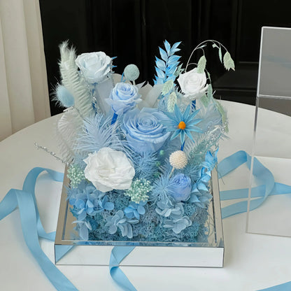 LULU ROSÉE Ice Island Dream Acrylic Box with Blue Ribbon, Preserved Flower Arrangement