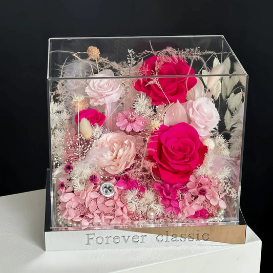 LULU ROSÉE pink flame barbie acrylic box in a modern living room