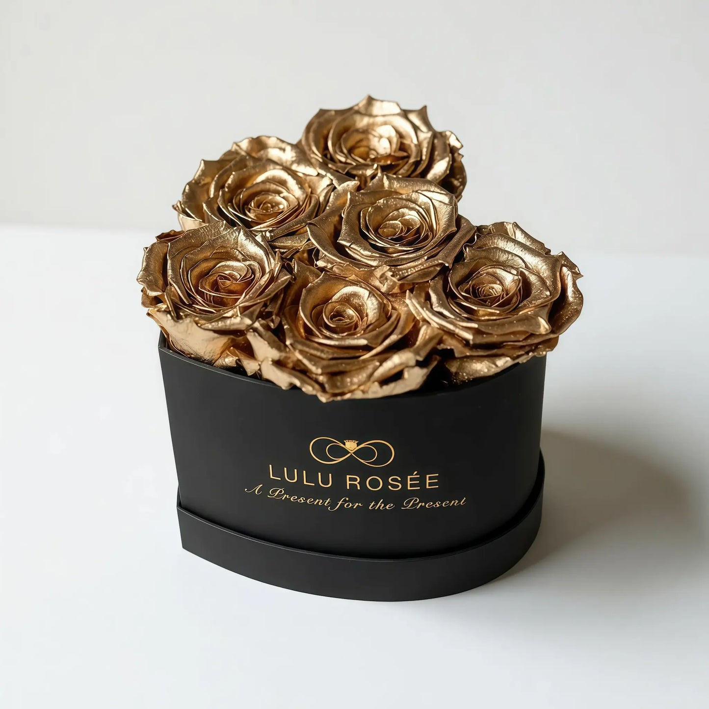 LULU ROSÉE baby heart box gold roses black classic box on white background