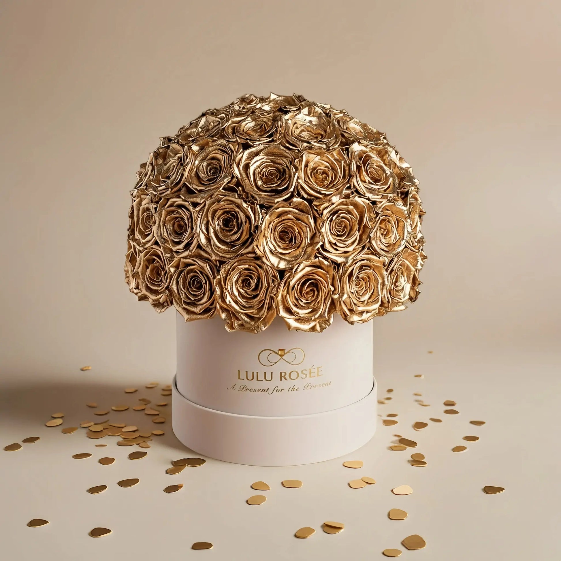 LULU ROSÉE superdome box gold roses  beige box on a beige background
