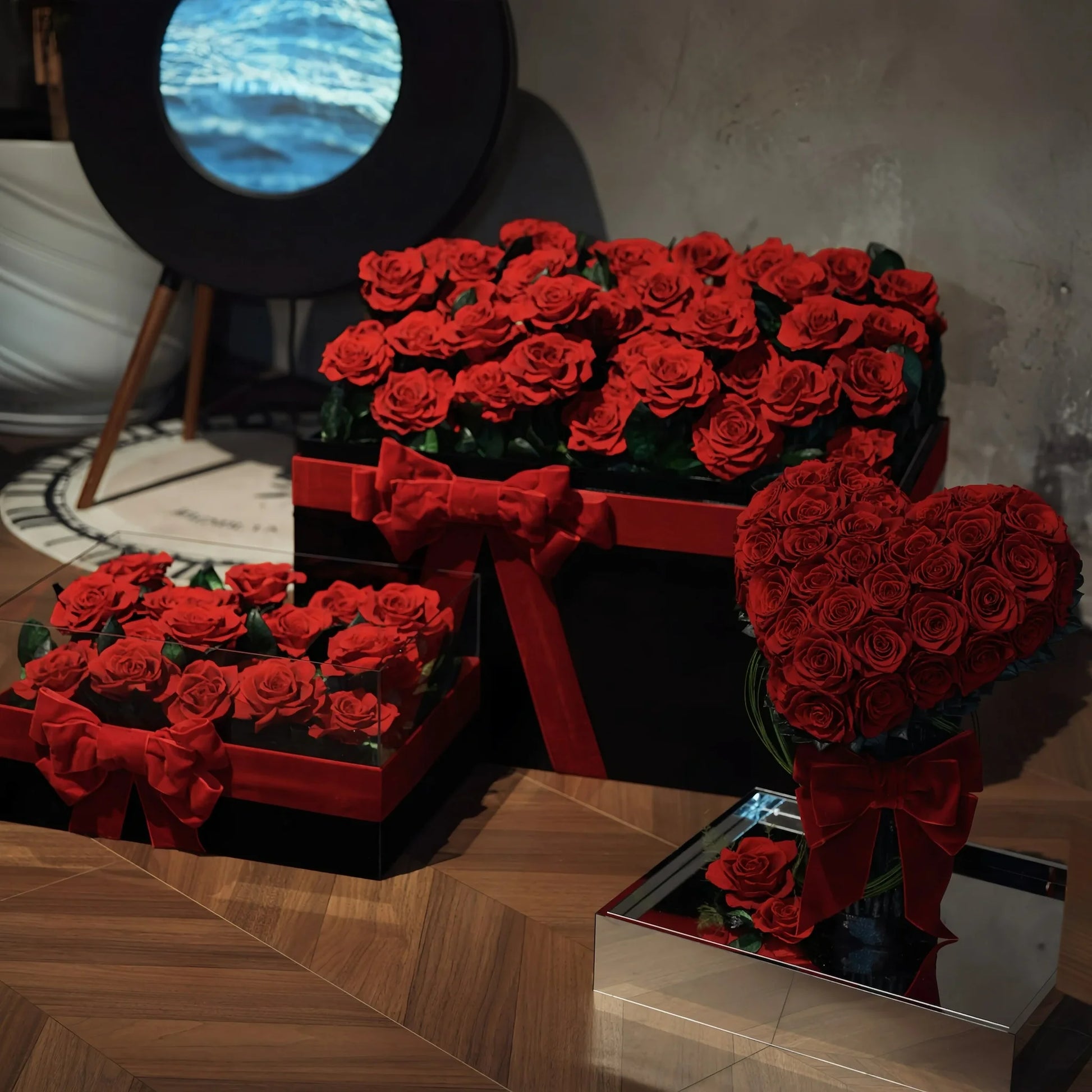 LULU ROSÉE Eternal Rose Garden Collection on Wooden Floor, All Three Preserved Red Rose Arrangements