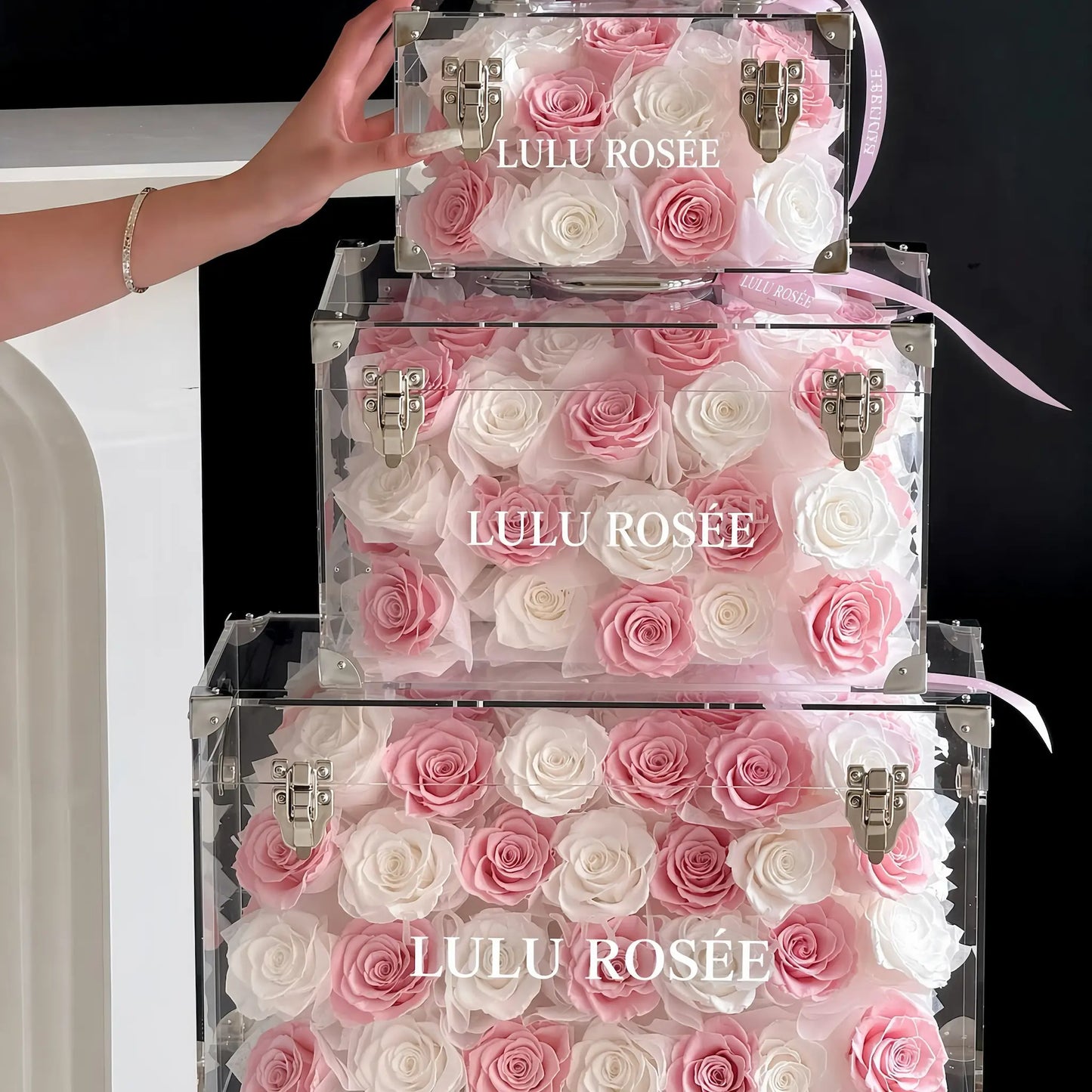 LULU ROSÉE Grande Eternal Acrylic Handbag Rose Box, luxury handbag-shaped transparent acrylic gift box filled with layered pink white preserved roses, customizable flower colors, romantic everlasting floral souvenir for anniversary & birthday gifting