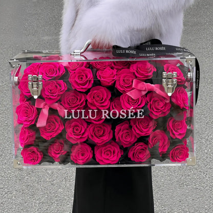 LULU ROSÉE Grande Eternal Acrylic Handbag Rose Box, luxury handbag-shaped transparent acrylic gift box filled with dark rosy preserved roses decorated with silk ribbon, customizable flower colors, romantic everlasting floral souvenir for anniversary & birthday gifting