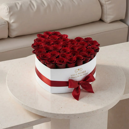 LULU ROSÉE large heart box red roses white classic box on a dining table
