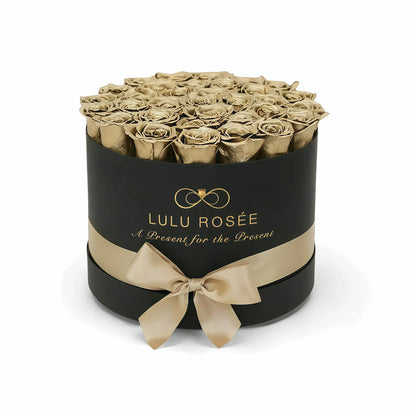 Black box with gold roses and a bow, featuring Lulu Rosée branding.