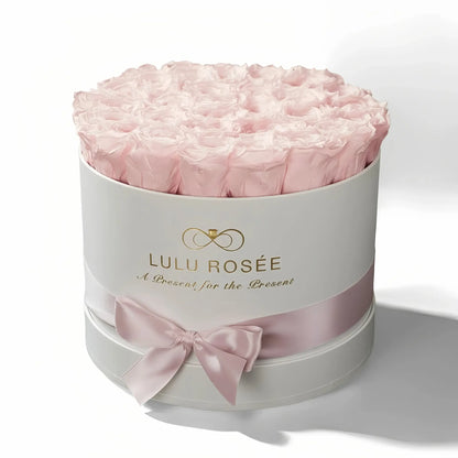 LULU ROSÉE large round box light pink roses white classic box on white background