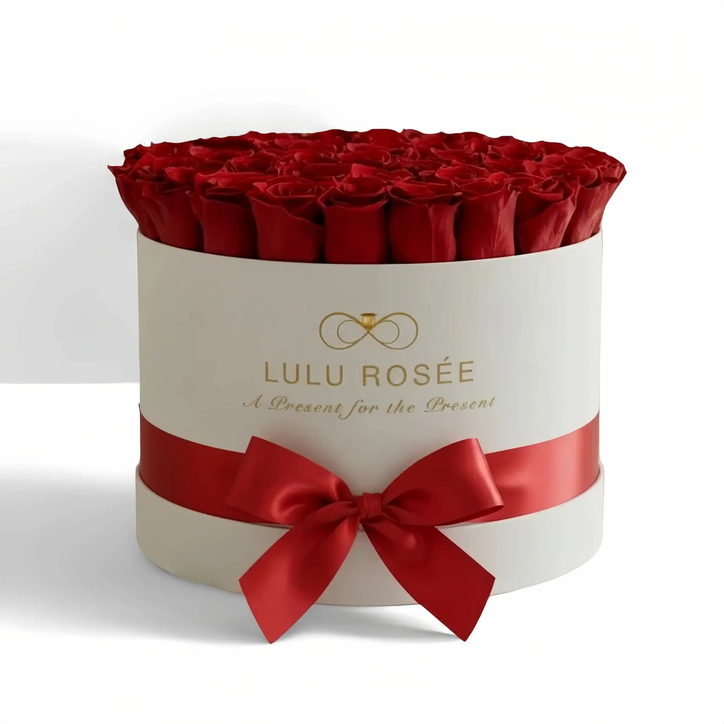 LULU ROSÉE large round box red roses white classic box on white background