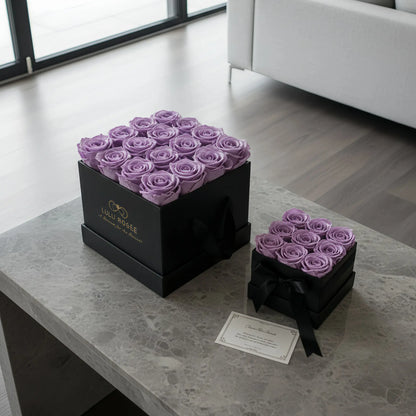 LULU ROSÉE medium square box lavender roses black classic box in an elegant bedroom