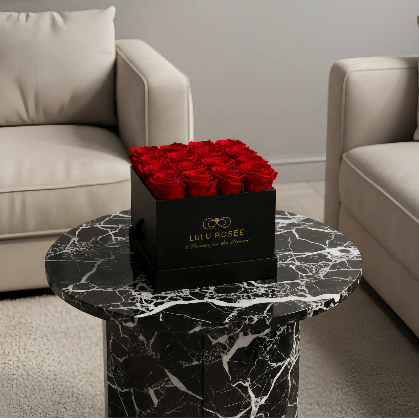 LULU ROSÉE medium square box red roses black classic box on a marble side table in a living room setting