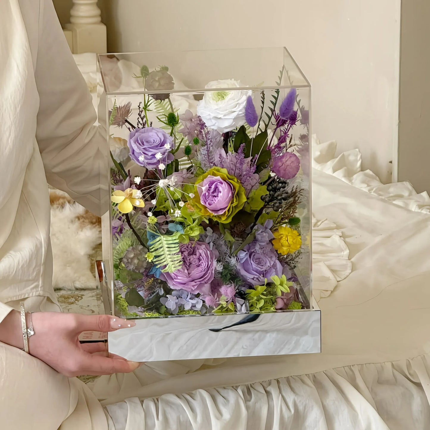 LULU ROSÉE Holding Monet's Garden Acrylic Box, Purple and Yellow Everlasting Flower Arrangement