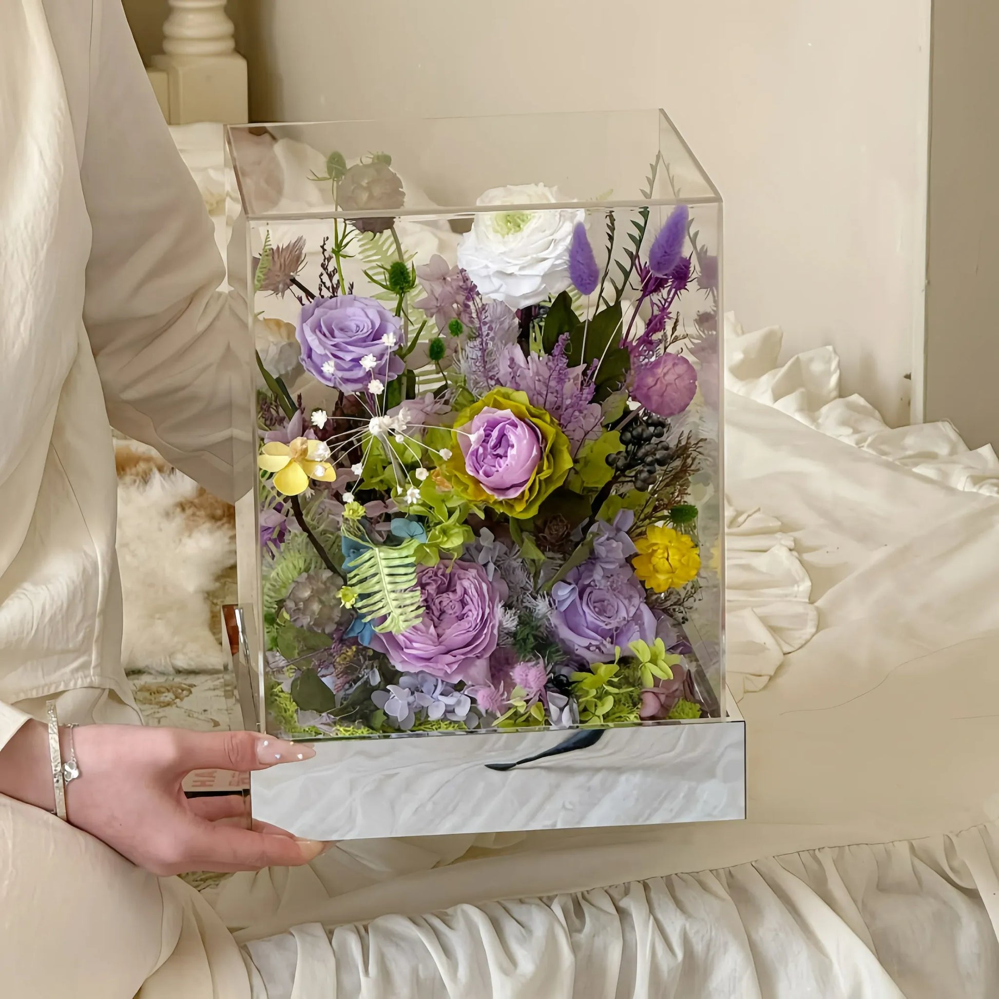LULU ROSÉE Holding Monet's Garden Acrylic Box, Purple and Yellow Everlasting Flower Arrangement